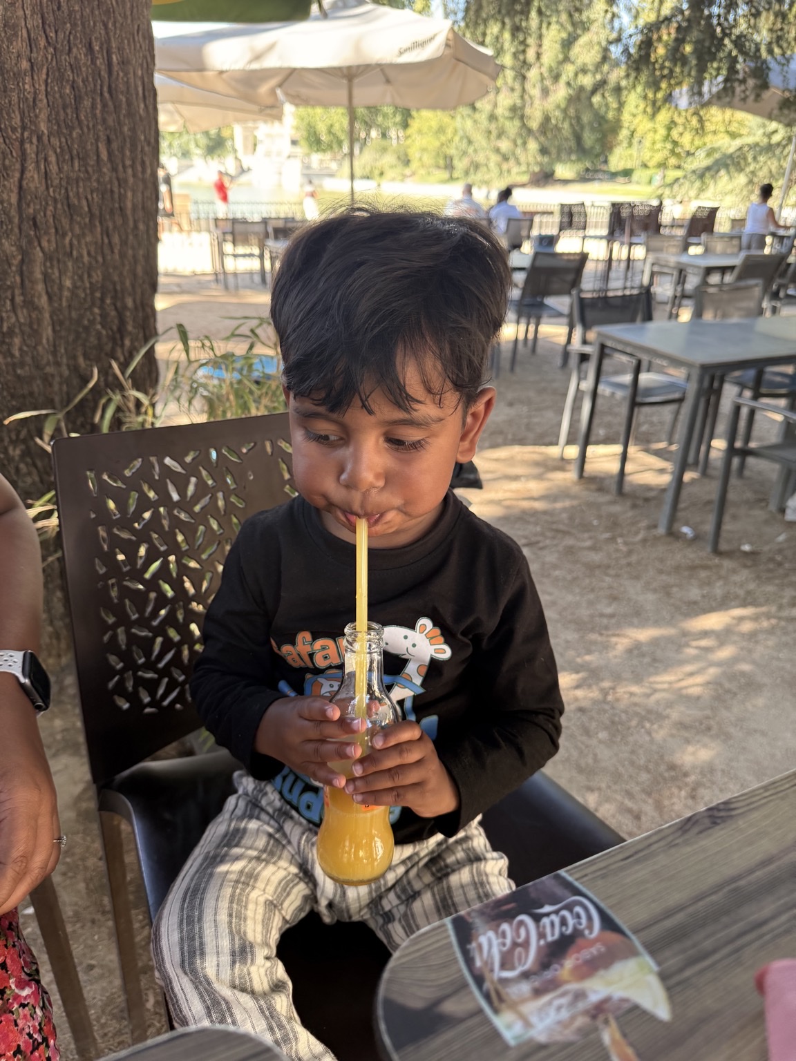 Savya sipping Minute Maid
